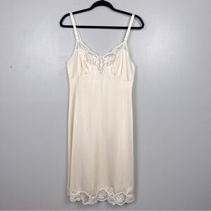 Vintage Shadowline ivory full length lace trimmed slip, size 36 tall.